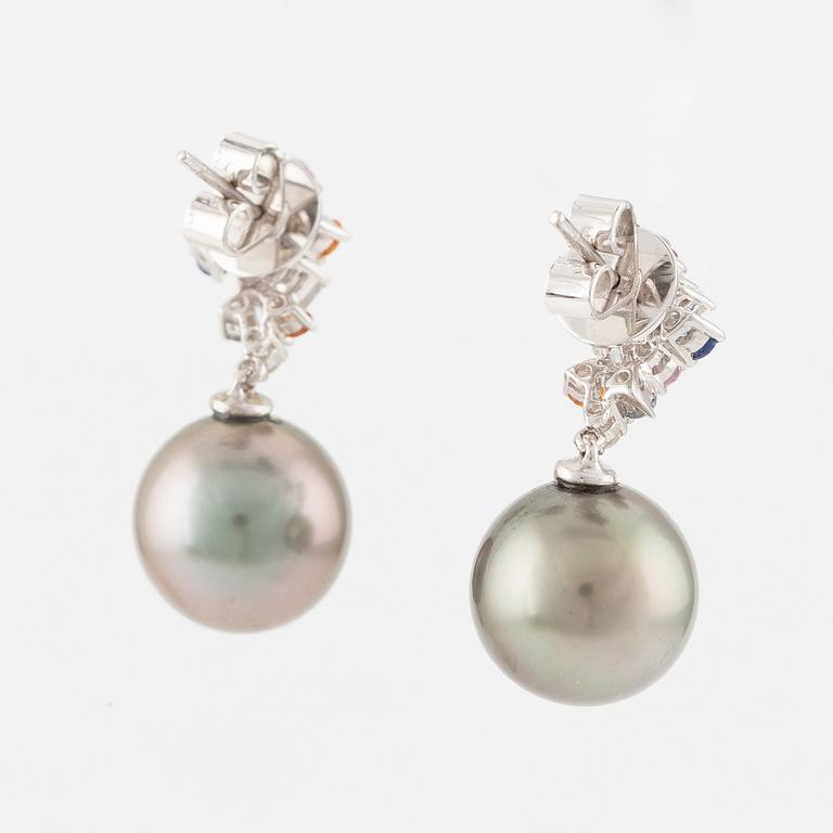 Earrings, a pair with cultured South Sea pearls, multi-coloured sapphires, and baguette and brilliant-cut diamonds.