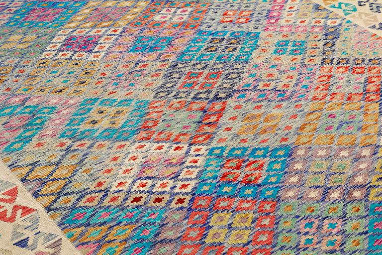 A Kilim carpet ca 295 x 253 cm.