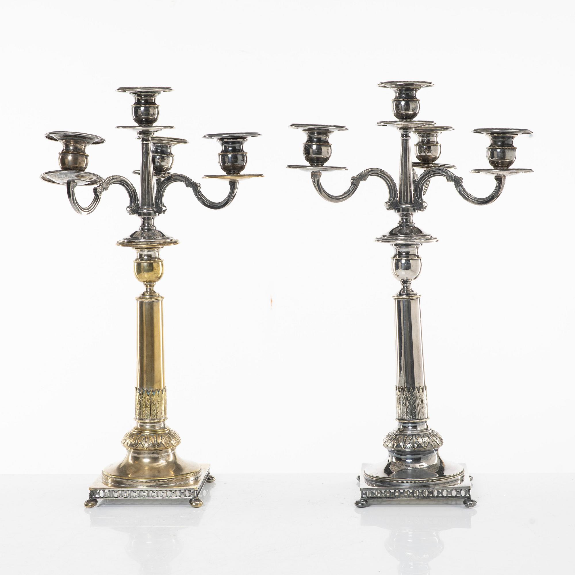 A pair of silver plated candelabra, CG Hallbergs Guldsmeds Ab, Stockholm, first half of the 20th century.