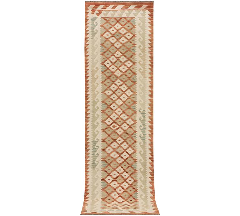 An Afghan kilim runner, c. 296 x 78 cm.