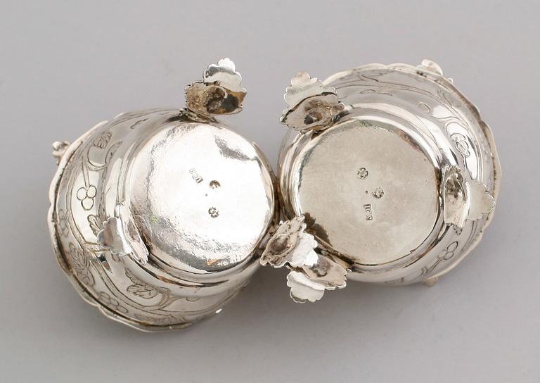 A pair of German 18th century parcel gilt jelly-pots, marks of  Johann Christoph Seelingslow, Magdeburg.