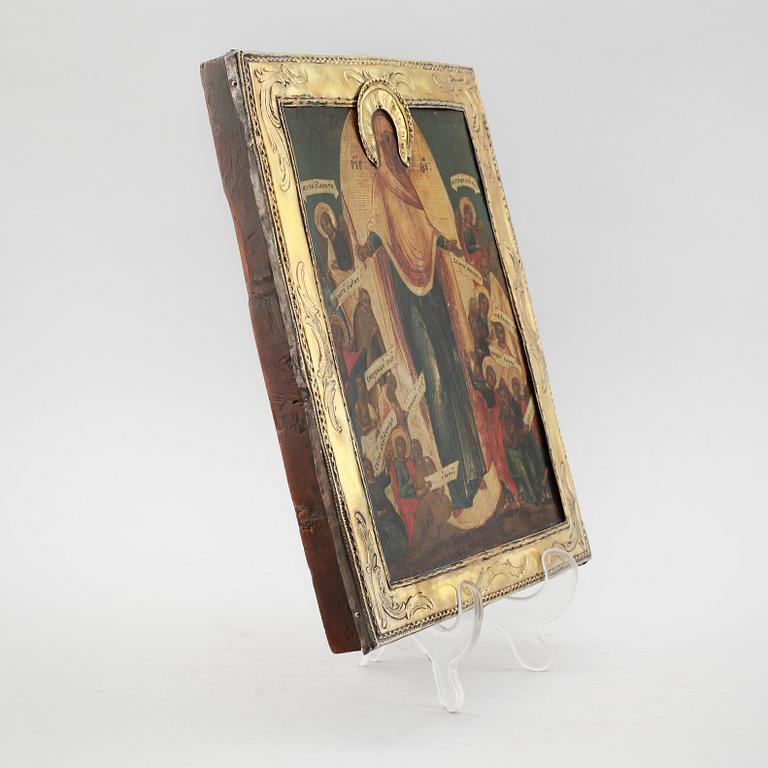 IKON, tempera på pannå, basma av förgyllt silver, St Petersburg, 1775.