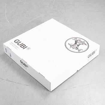 A mirror "Adnet" with leather hanging in original box, designed 1950 by Jacques Adnet for Gubi, Denmark.