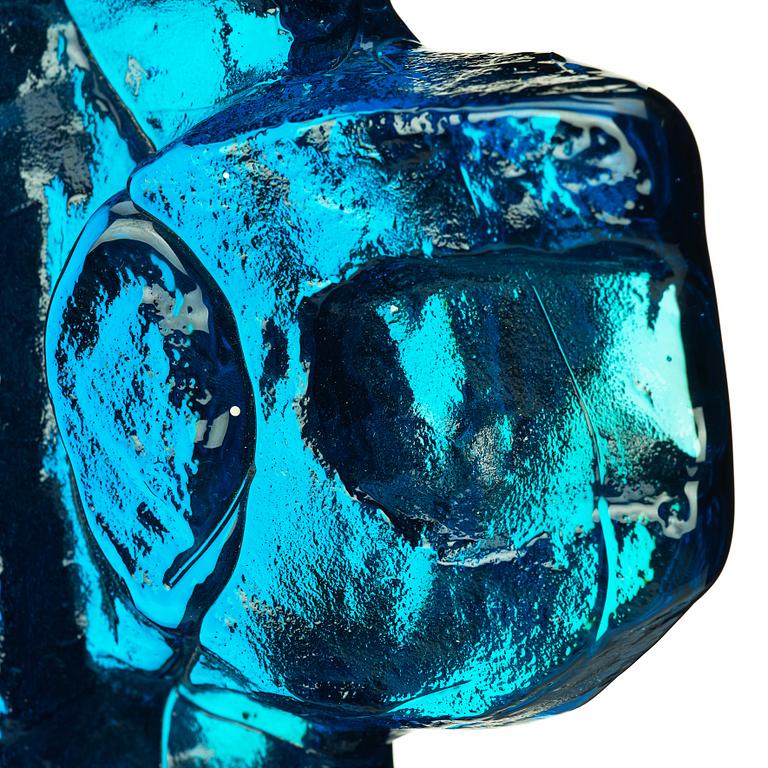 Edvin Öhrström, a blue/ turquoise coloured cast glass sculpture of a bull's head, Lindshammar glassworks, Sweden, signed and dated 1953.