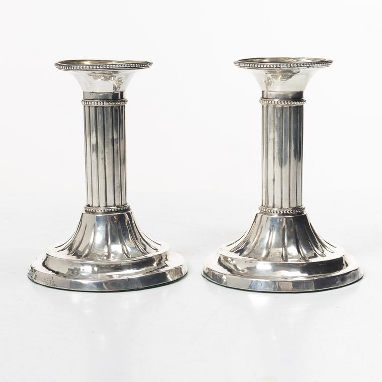 A Swedish pair of 18th century Gustavian silver candlesticks, worn city and maker’s marks, Sweden 1795.