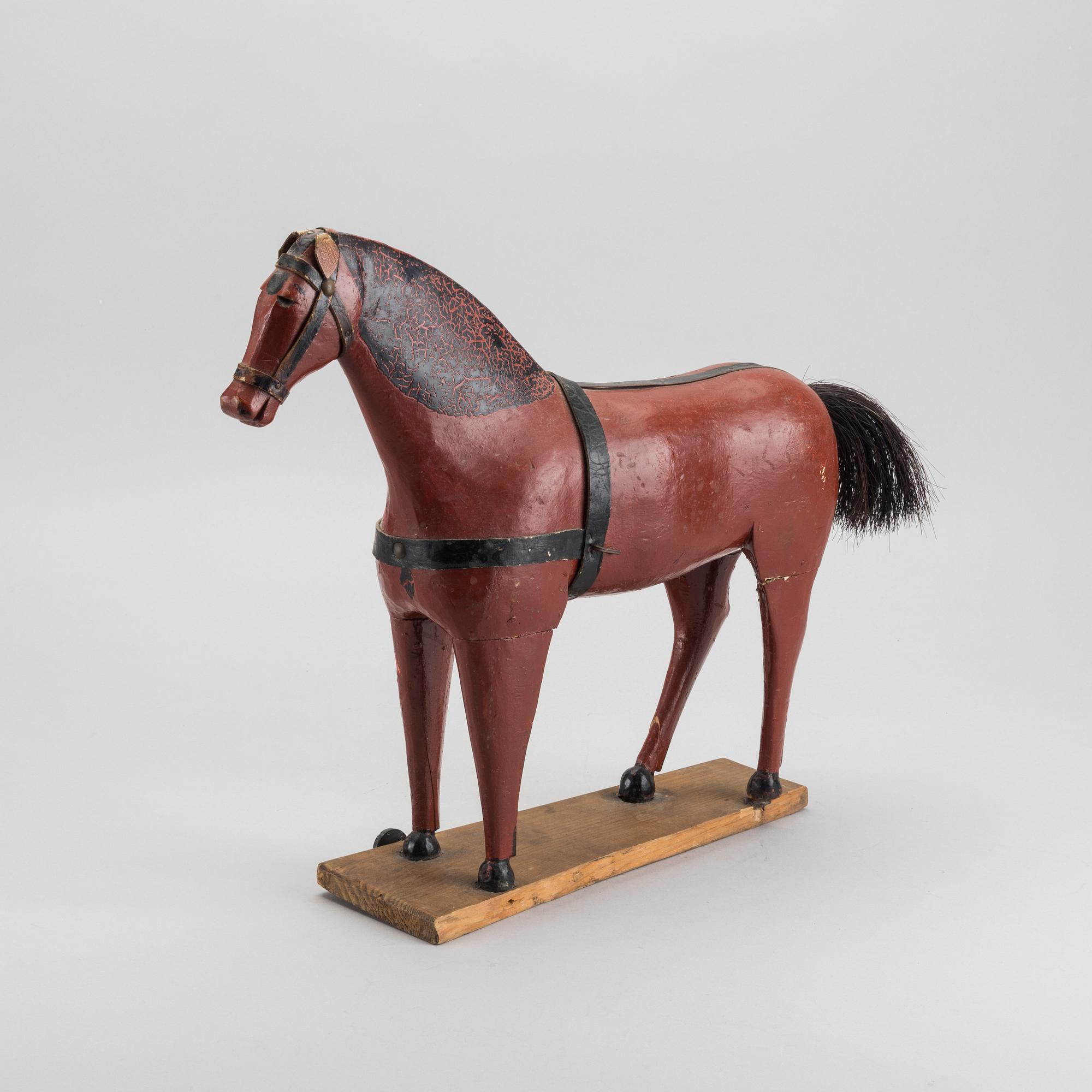 A toy wooden horse, late 19th cenury / turn of the century 1900.