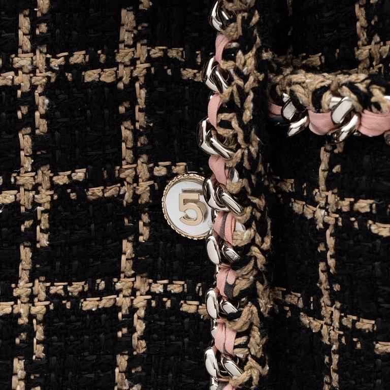 Chanel, a bouclé jacket size 34.