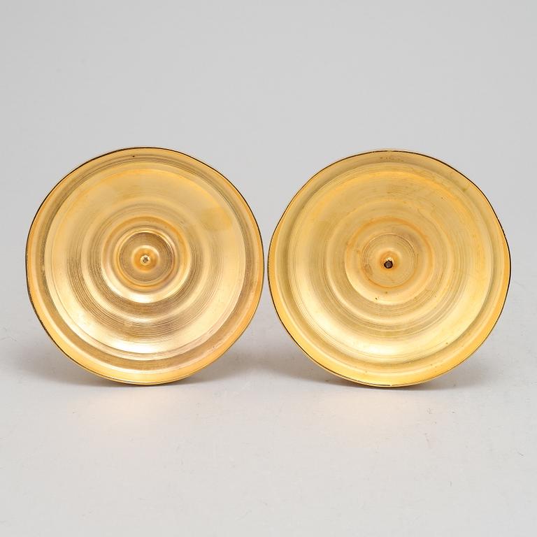 A pair of french Empire candlesticks, first half of the 19th Century.