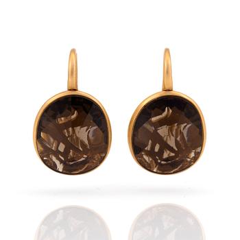 A pair of 'Arabesque', earrings by Pomellato set with mixed-cut smokey quartz.