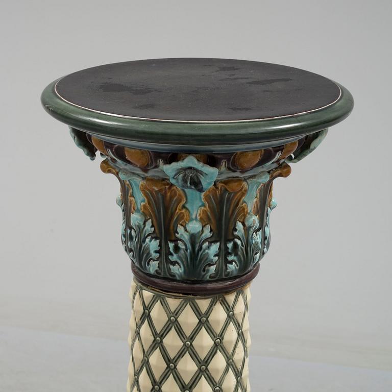 An end of the 19th century maiolica pedestal by Rörstrand.