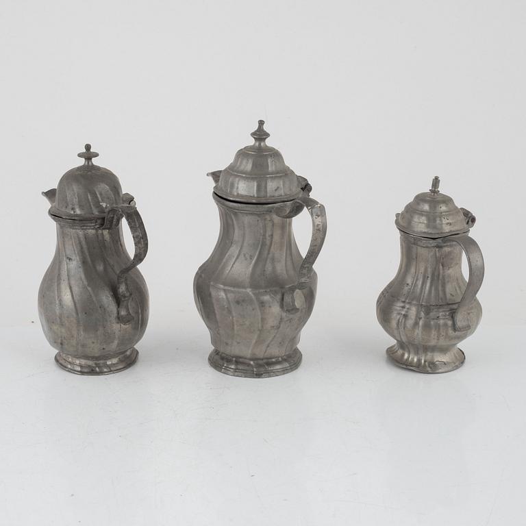 Three Rococo pewter coffee pots, 18th century.