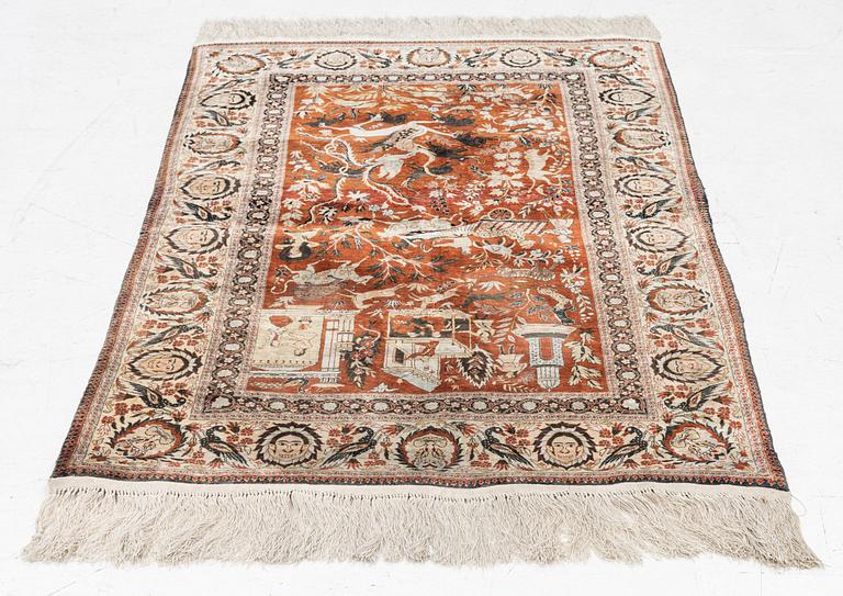 A Keysari figural silk rug, c. 121 x 76 cm.