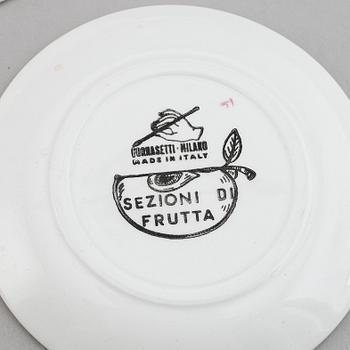 Piero Fornasetti, eight ceramic coasters, Milan, Italy.
