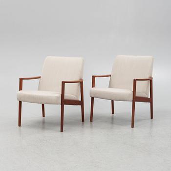A pair of mid-century easy chairs.
