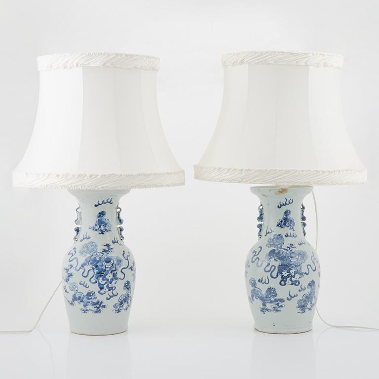 A pair of Chinese vases, mounted as lamps, early 20th Century.