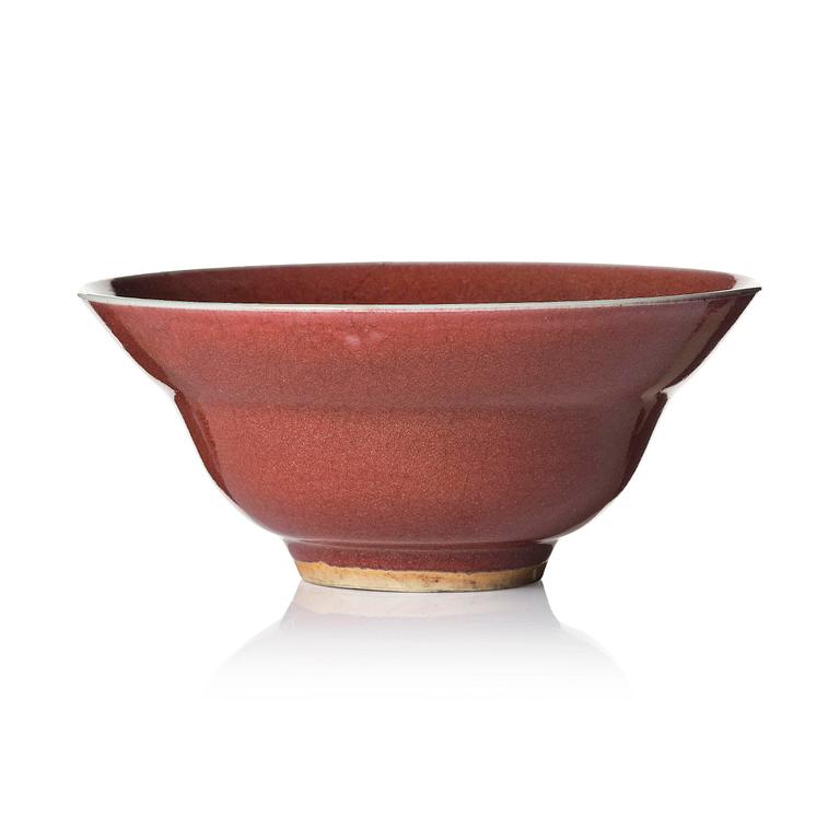 A red glazed bowl, Qing dynasty, 18th century.