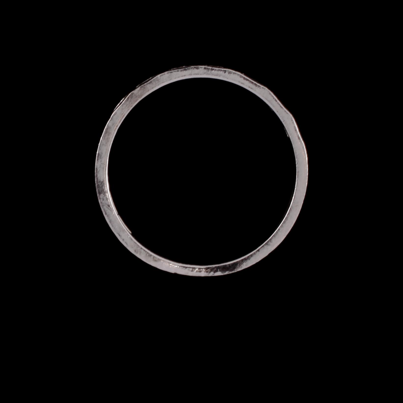 RING, 18k vitguld med 7 åttkantslipade diamanter, Bo Cedstam, Stockholm, 1969. Vikt 3 g.