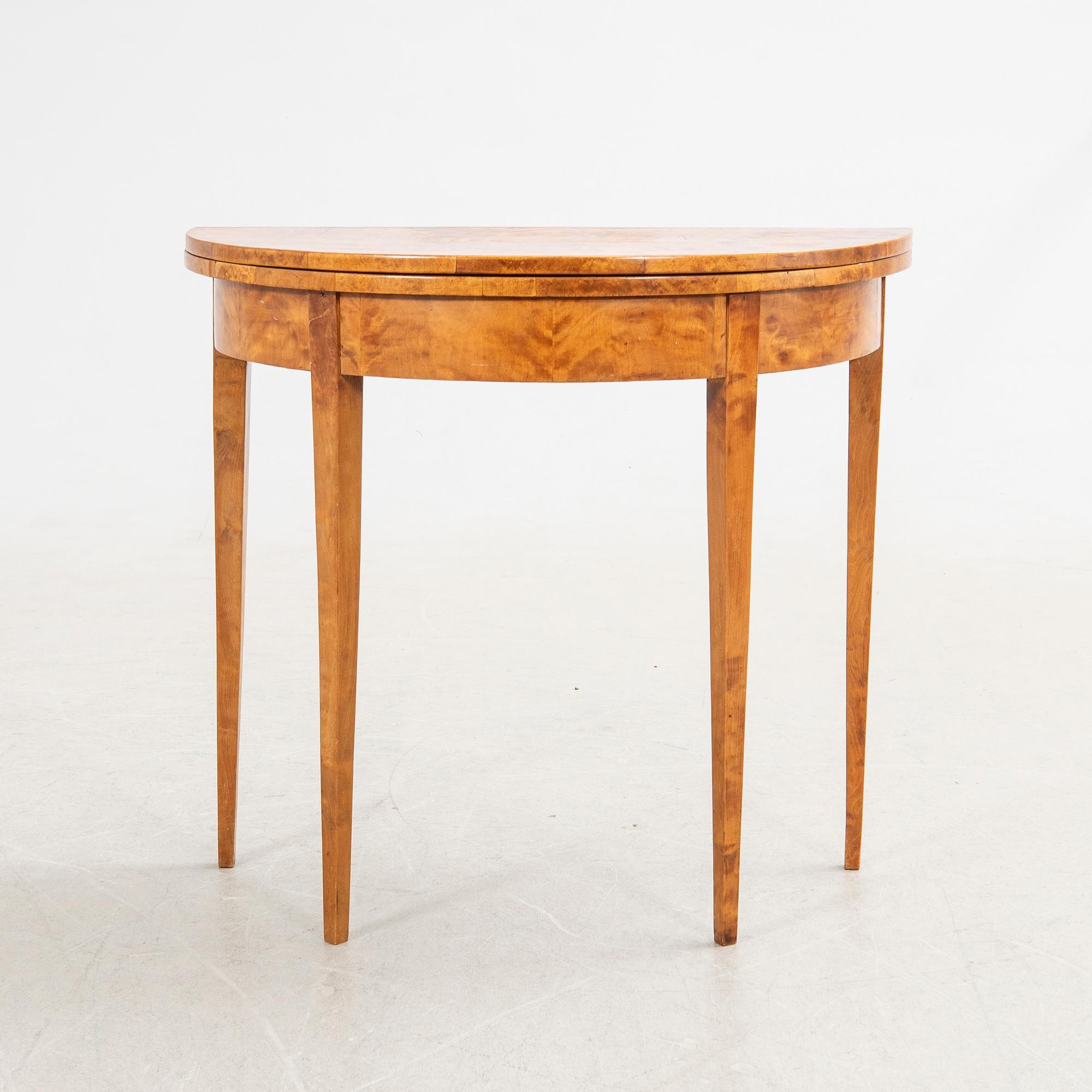 Half-moon table, 19th century.