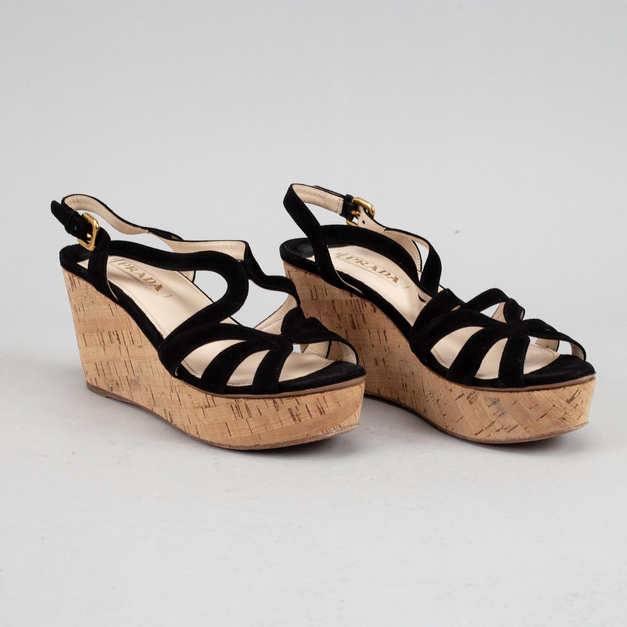 Prada, a pair of black suede wedge sandals, size 39½.