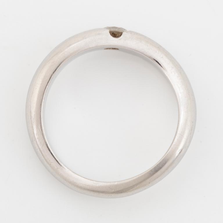 Platinum and brilliant cut diamond ring.