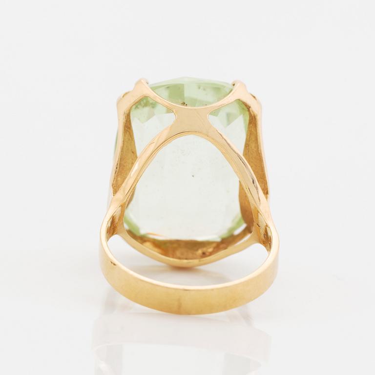 Synthetic green spinel cocktail ring.