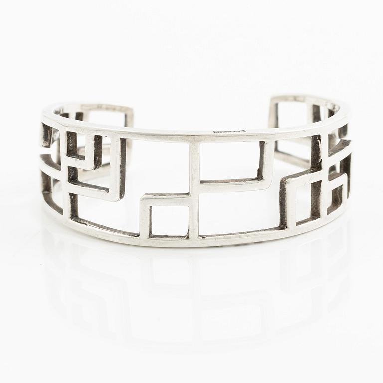 Claës E. Giertta, a ring and a bangle, silver, Stockholm 1961 and 1965.