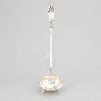 A Swedish silver "Empire" soup ladle, maker's mark Carl Winnerstrand, Stockholm, 1908.