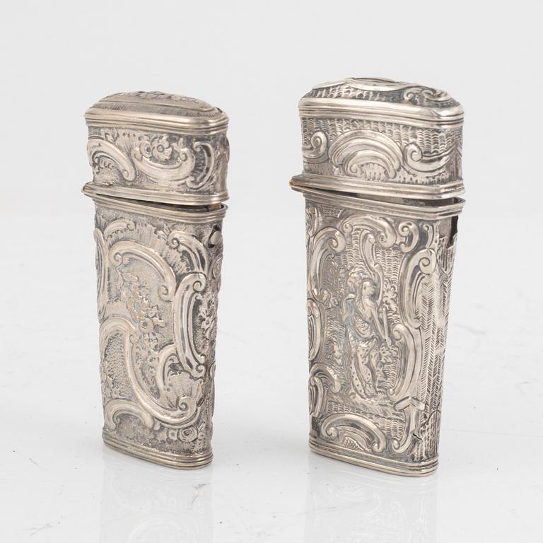 Two Historismus repousse silver etuis, later part of the 19th century.