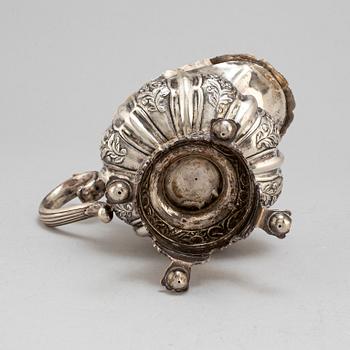 A Russian parcel-gilt silver creamer,  1842, probably Moscow.