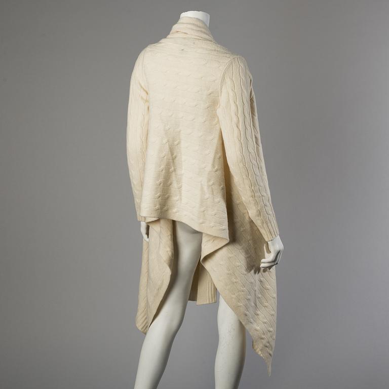 A white wool- and cashmere poncho by Ralph Lauren.