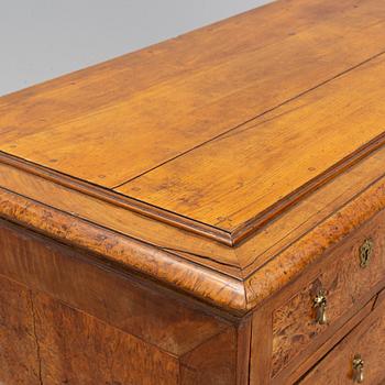 A Swedish root veneered late baroque chest of drawers, first half of the 18th century.