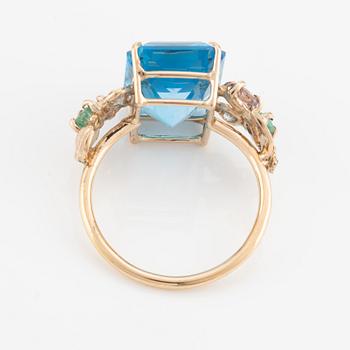 Ring, cocktail ring with large blue topaz, tourmalines, emeralds, and brilliant-cut diamonds.