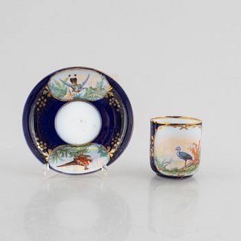 A set of nine porcelain coffee cups with saucers, Kuznetsov, Russia (1891-1917).