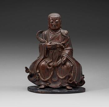 459. A bronze figure of a daoistic deity, 17th century.