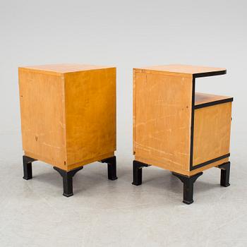 A pair of art déco bedside tables.