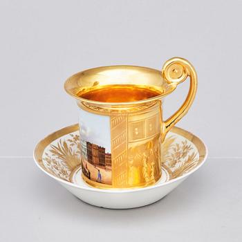 A German topographical cup with stand, 19th Century.