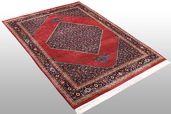 A rug, Tabriz, ca 241 x 167 cm.