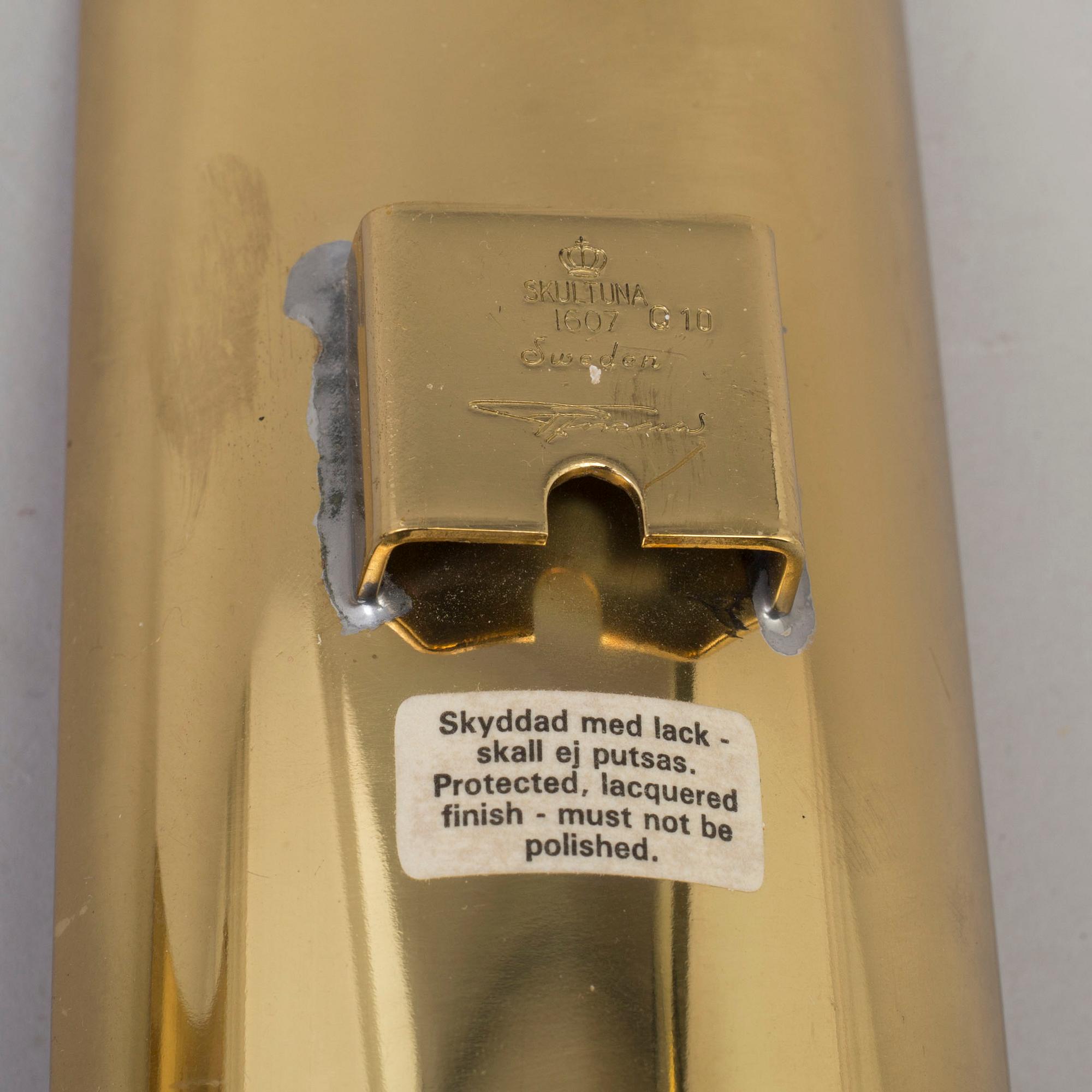 12 pieces of brass, including some by Pierre Forssell, Skultuna.