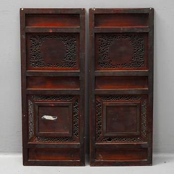 Two Chinese wooden carved panels, 20th century.