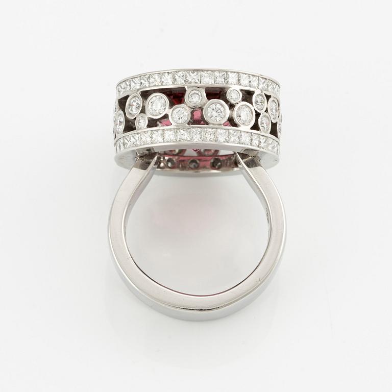 A Gaudy platinum ring set with a faceted tourmaline.