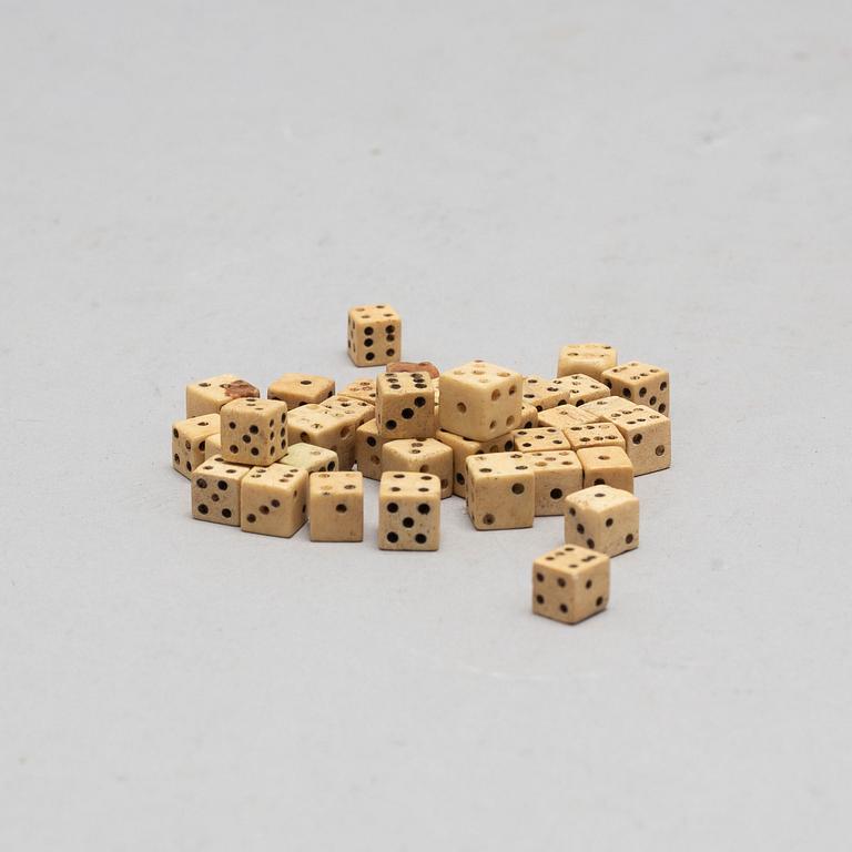 A set of 37 19th century miniature bone dice.