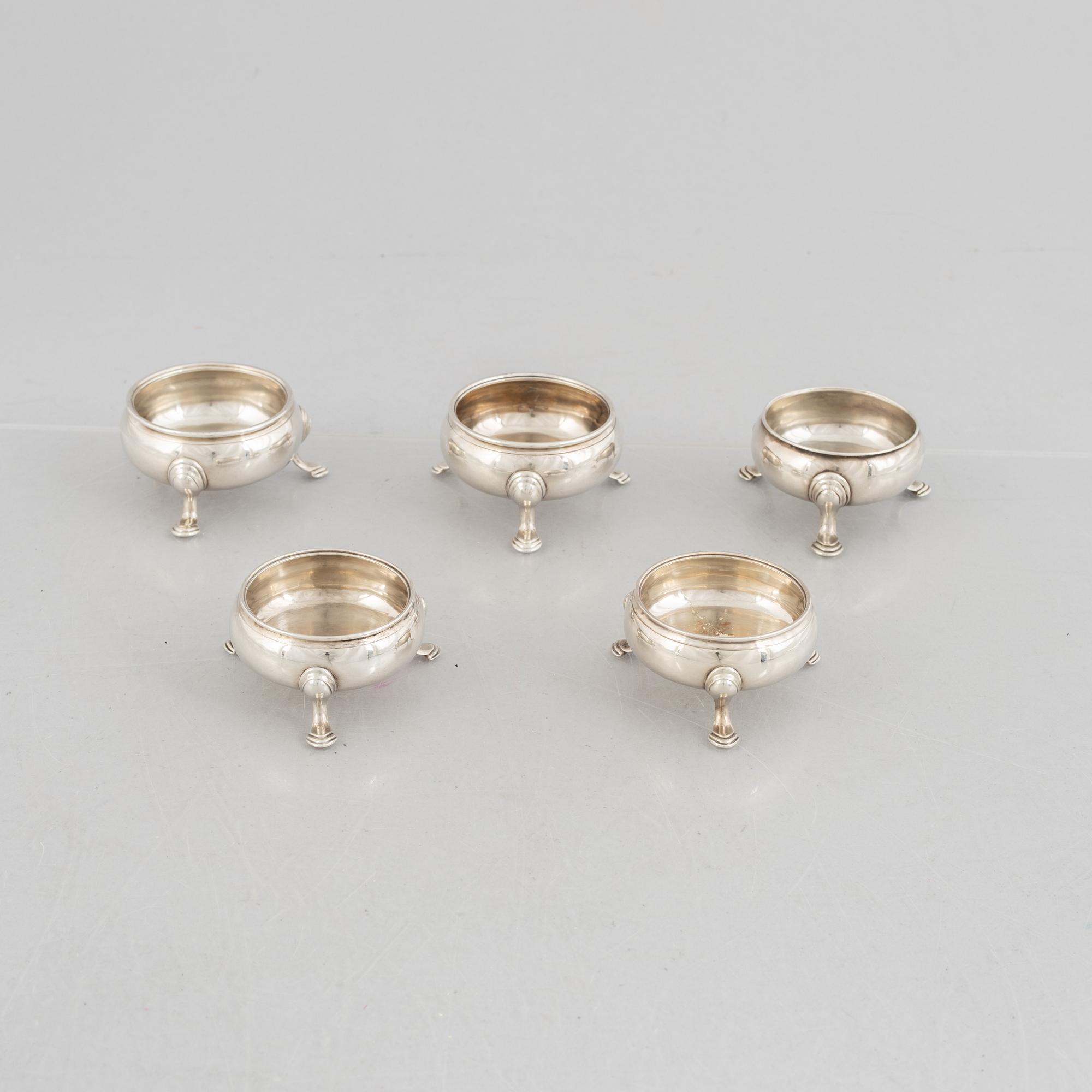 Five English silver salt cellars, circa mid 18th Century.
