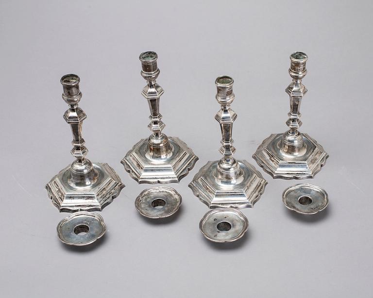 Two simular pairs of candlesticks, two marked Barde, Geneve 18th century, two with later marks.