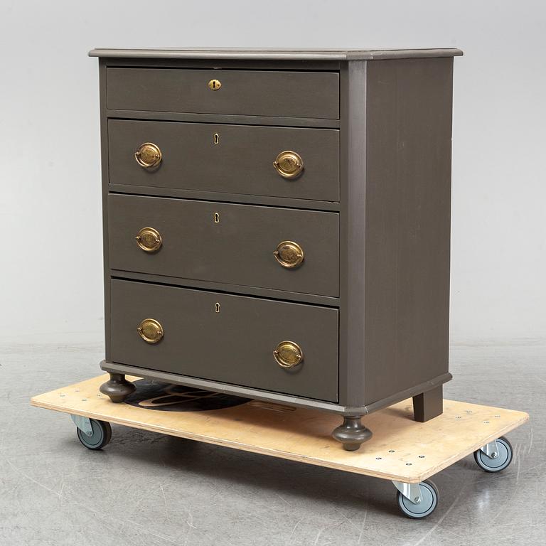 A painted chest of drawers, late 19th Century.