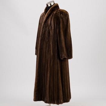 A Long Brown Mink Coat by Grosvenor to Harrods.
