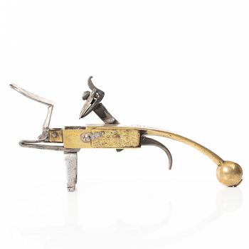 A Northern European flintlock lighter, mid 18th century.