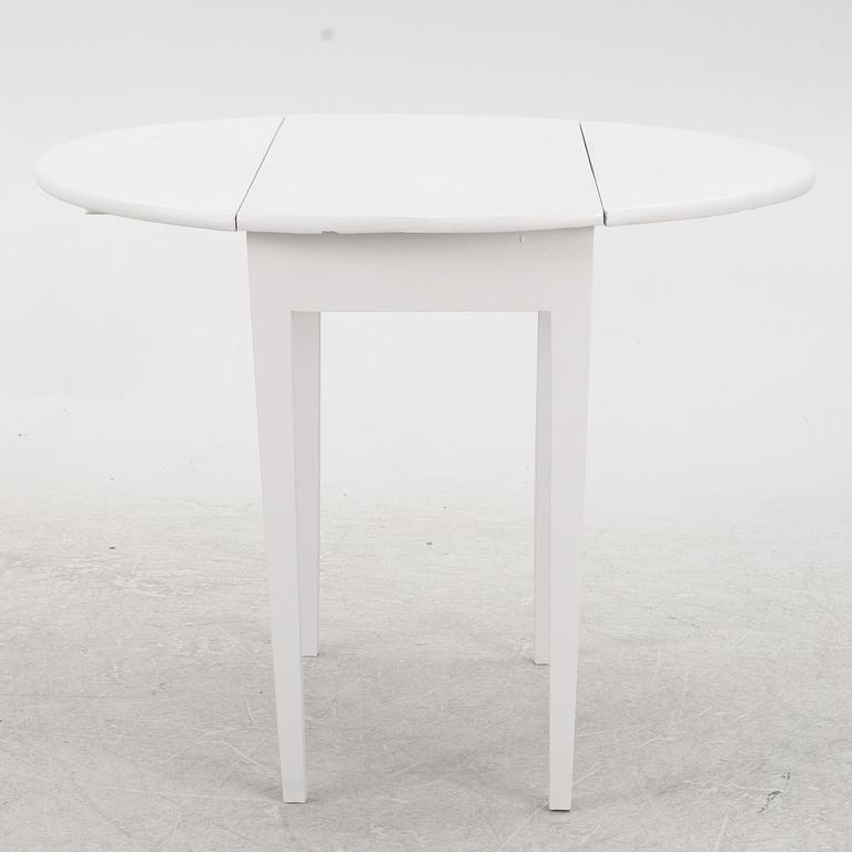 A drop-leaf table, late 19th Century.