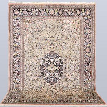 A Oriental, silk carpet, 275 x 183 cm.