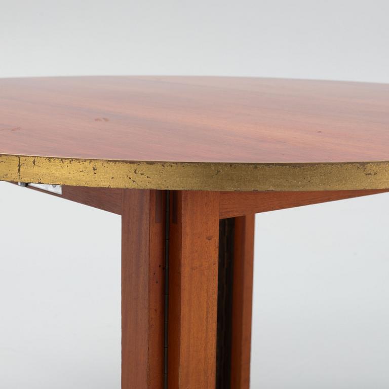 A mid 20th century dining table.