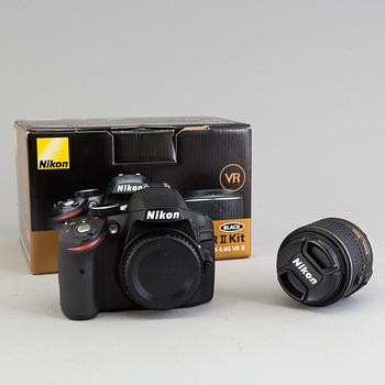 a digital black body D3200 Nikon camer with a nikon AF-S Nikkor  18-55 mm 1:3.5-5.6G VR II lens.